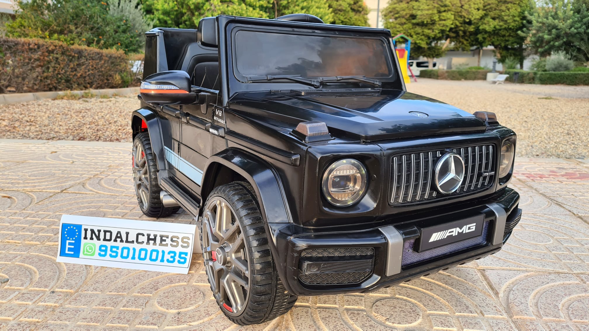 GOPLUS Coche eléctrico para niños de 12 V Mercedes Benz G500, con mando a distancia, faros, música y claxon, puertas con cerradura, cinturón de seguridad, vehículo eléctrico para niños a partir de